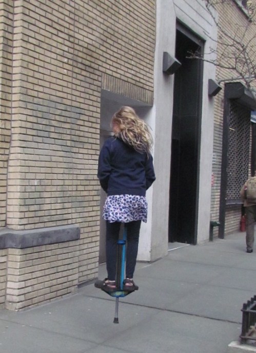 *Em on the pogo-stick